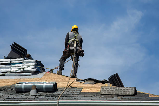 Professional Roofing technician working in West College Corner, IN